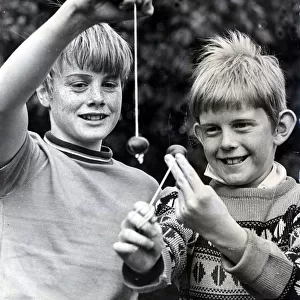 Conkers - Two young lads playing conkers. 25 September 1970