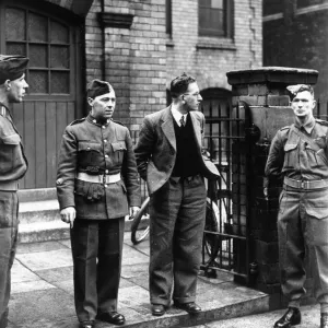 Print of Sidney Spencer walking to Liverpool tribunal, 25th March 1941