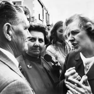 Conservative Party leader Margaret Thatcher chats to local people during a visit to