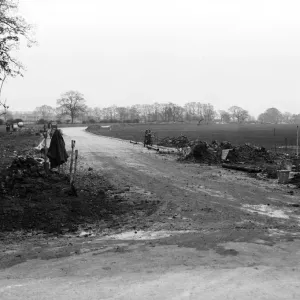 Construction of a new road off of Long Lane signals the beginning of a new housing Construction of a new road off of Long Lane signals the beginning of a new housing
