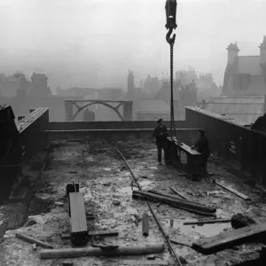 Construction of the new Tyne Bridge. The huge steel framework which has been assembled Construction of the new Tyne Bridge. The huge steel framework which has been assembled