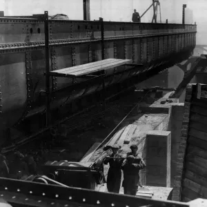 Construction of the new Tyne Bridge. The huge structure of the new Tyne Bridge is given a Construction of the new Tyne Bridge. The huge structure of the new Tyne Bridge is given a