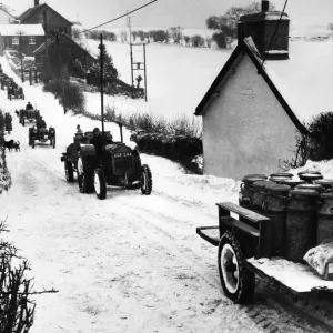 Convoy of vehicles managing to deliver milk to even the most remote areas in Wales Convoy of vehicles managing to deliver milk to even the most remote areas in Wales