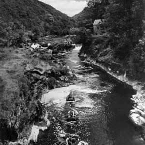 Coracle fishers on the River Teifi at Cenarth: Following a pattern evolved over two