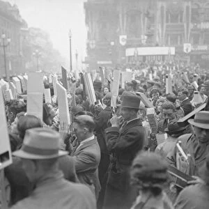 Coronation of King George VI. Huge crowds of people with their periscopes to get a