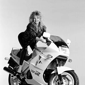 Corrinne Russell glamour model with motorbike. 22nd April 1986