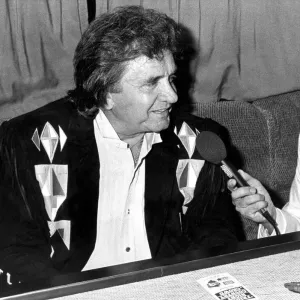 Country and Western singer Johnny Cash being interviewed before appearing at Bents Park