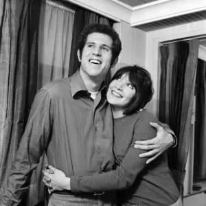 Couple embracing with the woman looking up to the man. December 1969 Z11624 Couple embracing with the woman looking up to the man. December 1969 Z11624