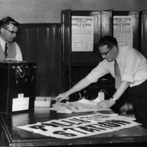 Courtroom into polling station - Mr V. N. Bowen (left) and Mr H Courtroom into polling station - Mr V. N. Bowen (left) and Mr H