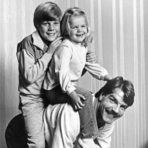 Coventry City footballer Sam Allardyce in happy mood, picturd at home with his children