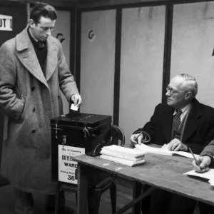 A Coventry voter casts his vote in the 1959 General Election at Cheylesmore polling A Coventry voter casts his vote in the 1959 General Election at Cheylesmore polling