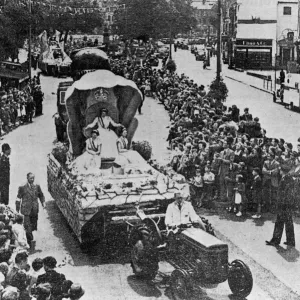 Coventrys Coronation Carnival procession with the main tableau carrying the carnival