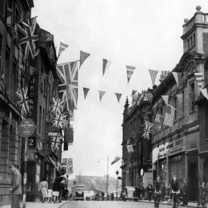 Coventrys High Street looking towards Earl Street is festooned with flags for the VE