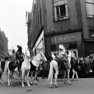Cowboys and Indians from Billy Smarts Circus ride into town Cowboys and Indians from Billy Smarts Circus ride into town