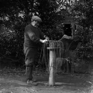 Print of Crab Pots Being Made in Cornwall, 1923 Print of Crab Pots Being Made in Cornwall, 1923