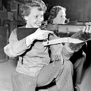 Cracking good shots: These two ladies of the Wandsworth Rifle Club are two cracking good