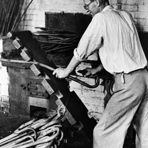 Craftsman making walking sticks circa 1935 Craftsman making walking sticks circa 1935