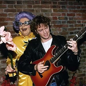 Craig Mclachlan the actor and singer with the man who plays the part of Dame Edna