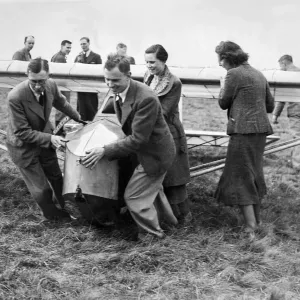 Cramlington Gliding Club members hauling into position their new machine