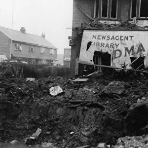 Crater and damage to the newsagent at the junction with Goddard Avenue and Woodlands