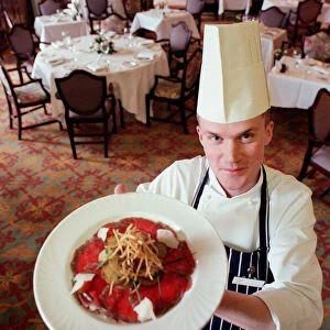 Crathorne Hall Hotel chef Phillip Pomfret standing in one of the many dining rooms at