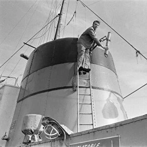 Crewman on the St Gerontius seen here repairing the ships radio antenna. 11th March 1978