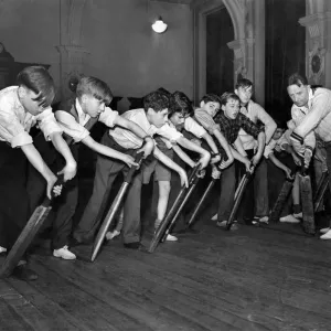 Cricket Coaching. Boys follow Mr. Moseleys example in this forward shot Cricket Coaching. Boys follow Mr. Moseleys example in this forward shot