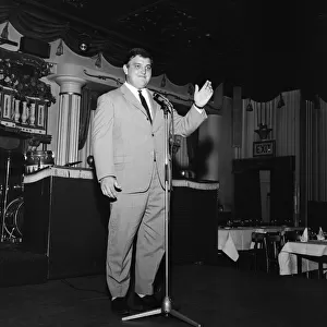 Cricketer Colin Milburn singing at the Astor Club, Mayfair. 30th April 1967