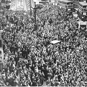 Crowd celebrating in Piccadilly Circus London on VE Day