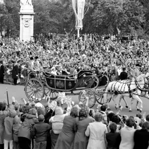 Crowd waving to the carriage of Queen Elizabeth II and Prince Philip Crowd waving to the carriage of Queen Elizabeth II and Prince Philip