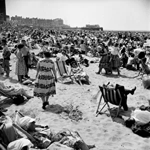 Crowds on the beach at Margate in Kent during a hot summer day