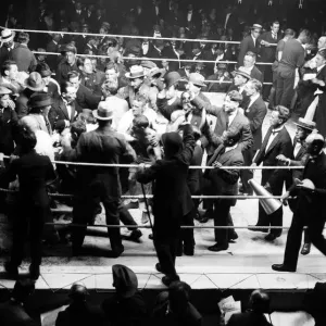 Crowds mob Jimmy Wilde at the end of his fight with Pal Moore after he had beaten