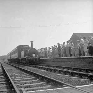 Crowds on the platform at Horsted Keynes station await the arrival of the London