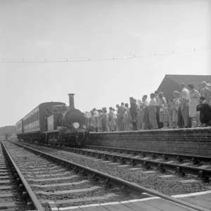 Crowds on the platform at Horsted Keynes station await the arrival of the London