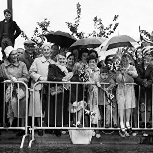 Crowds waiting to greet Queen Elizabeth II during her visit to Solihull in the West