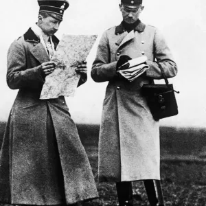 Crown Prince of Germany (left) seen here studying a map with one of his officer during