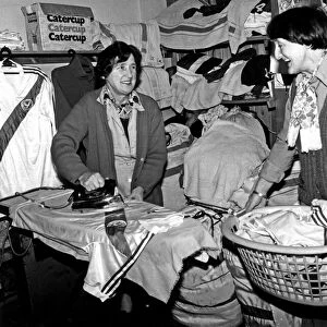 Crystal Palace laundry ladies prepare the shirts before a game against Manchester United
