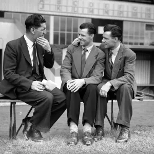 Crystal Palace manager Ronnie Rooke speaking to two players at a club meeting ahead of Crystal Palace manager Ronnie Rooke speaking to two players at a club meeting ahead of