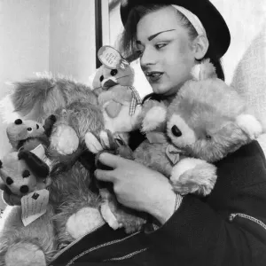 Culture club lead singer boy George with his cuddly toys he has saved from his fans Culture club lead singer boy George with his cuddly toys he has saved from his fans
