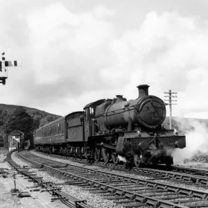 The Cumbrian Coast Express train passes Talerdigg bank on a summers day, Circa 1965
