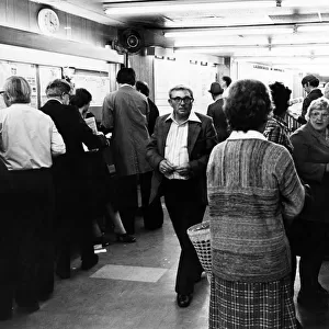 Customers at a betting shop. 5th June 1979