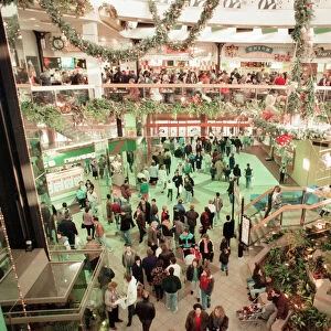 Customers pack Merry Hill Shopping Centre in Brierley Hill, first day of Christmas Sales