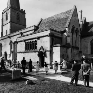 Customs: Clipping the yews: Every September the children of the Gloucestershire village Customs: Clipping the yews: Every September the children of the Gloucestershire village