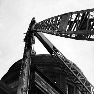 Customs House Demolition. A 10 ton Derrick crane is being erected behind the Customs