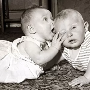 Two cute babies, circa 1950