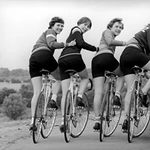Cycling Sisters: Group of girls going out for a ride on their bicycles. June 1978