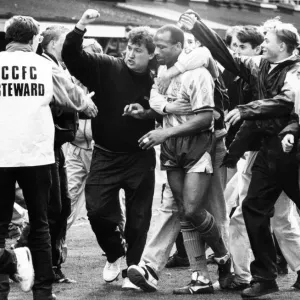 Cyrille Regis is surrounded by adoring Sky Blue fans at the end of his last home game for Cyrille Regis is surrounded by adoring Sky Blue fans at the end of his last home game for