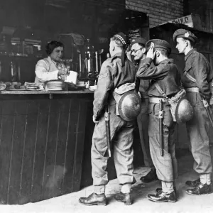 Daisy Green, aged 42, serving tea to soldiers at Waterloo Station, London