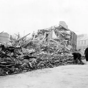 Damage to the corner of Croft and Rose Streets, Cardiff, following a Nazi raid Damage to the corner of Croft and Rose Streets, Cardiff, following a Nazi raid