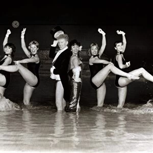 Dancer Peter Martindale and chorus girls from the West End show Charlie Girl performing a